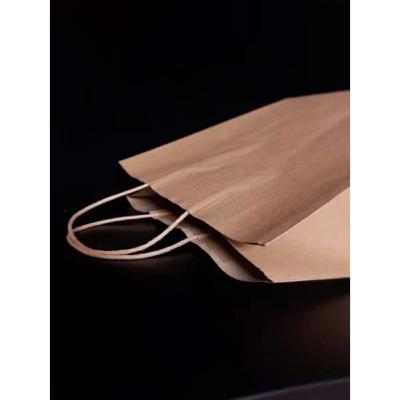 TÚI GIẤY KRAFT ĐÁY VUÔNG QUAI XÁCH TIỆN LỢI